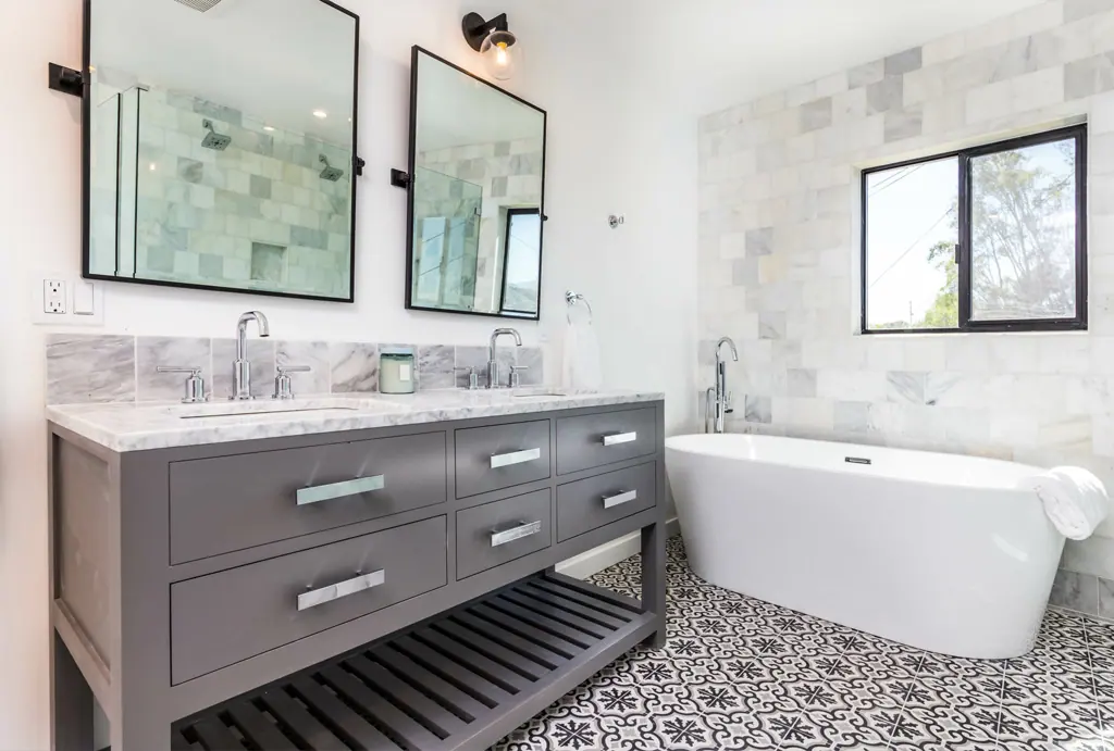 Finished bathroom with a frameless shower screen and a tiled wall niche, Canberra home