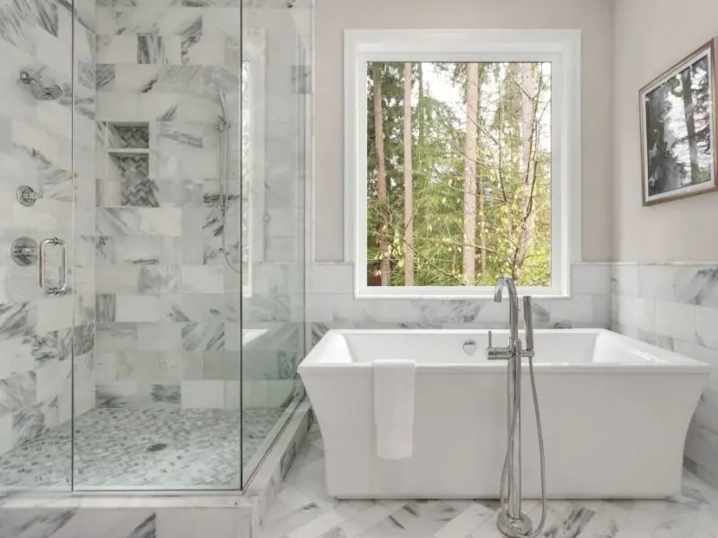Finished bathroom with a frameless shower screen, Canberra home