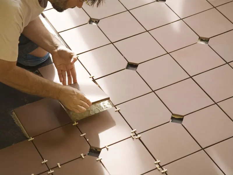 Graded shower floor sealed to the drain before tiling, Canberra home