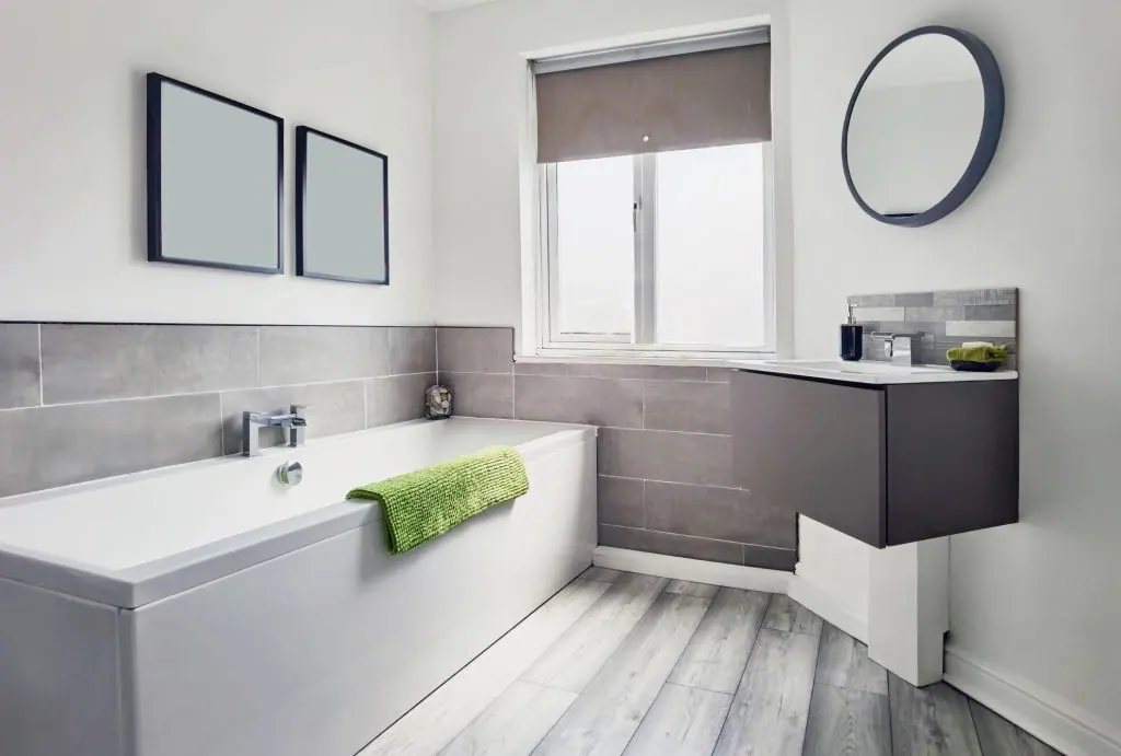 Renovated main bathroom with a walk-in shower and floor-to-ceiling tiles, Canberra home